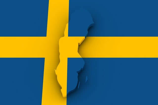 Svenska flaggan med en kontur av Sverige i mitten. Bilden symboliserar ett nätverk och en nationell mötesplats för Sveriges alla undersköterskor.